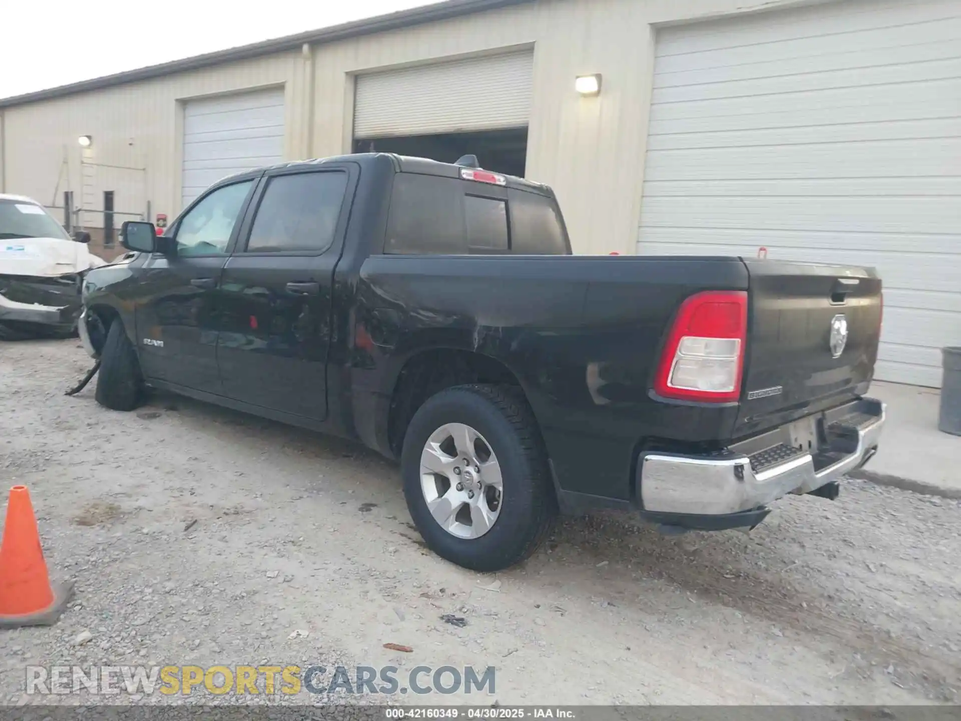3 Photograph of a damaged car 1C6RREFT3PN543679 RAM 1500 2023