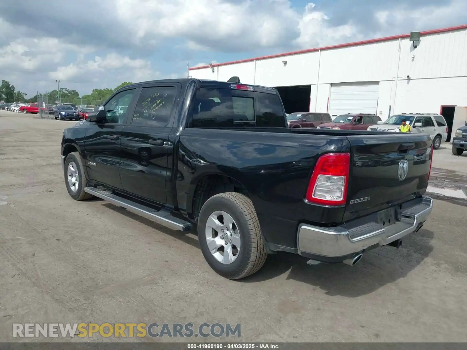 3 Photograph of a damaged car 1C6RREFT3PN619627 RAM 1500 2023