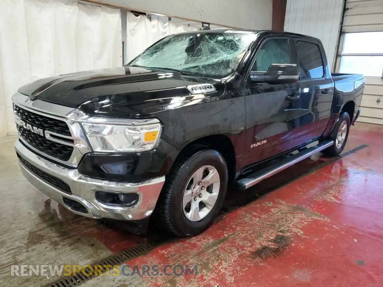 1 Photograph of a damaged car 1C6RREFT4PN559745 RAM 1500 2023