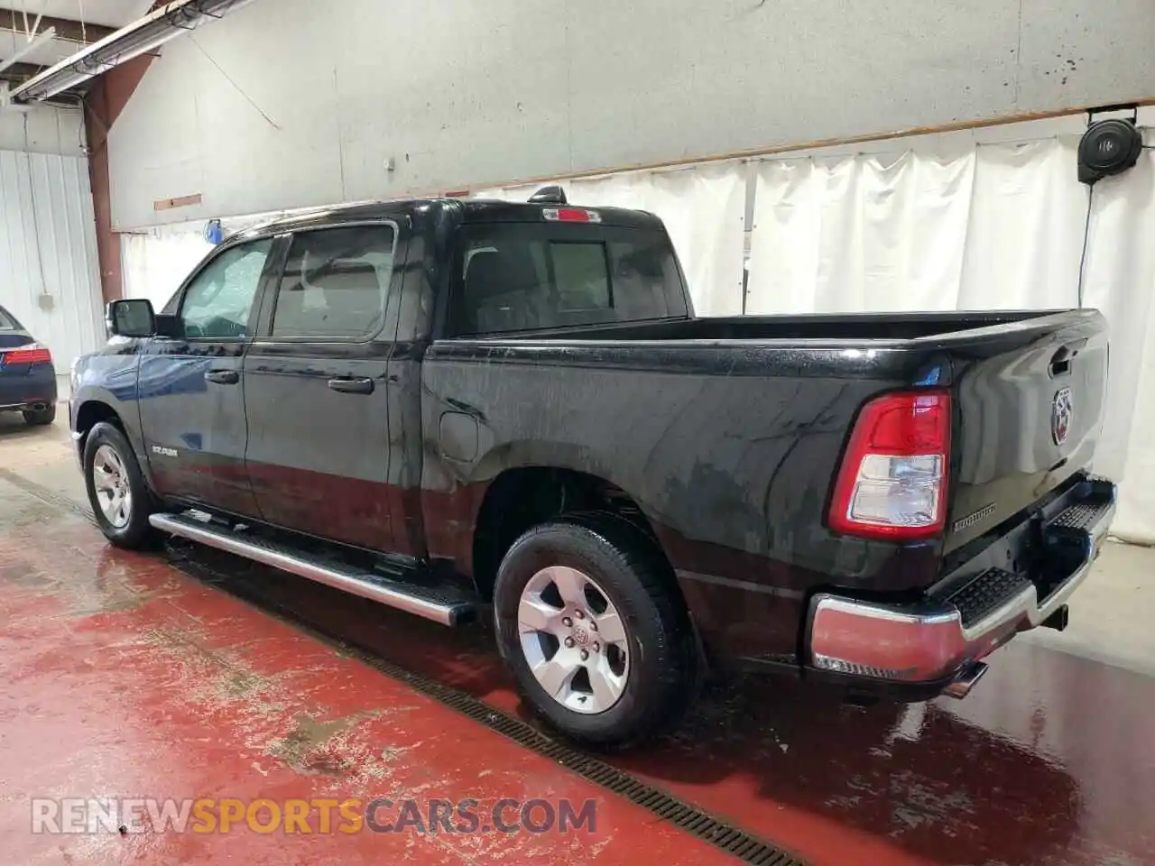 2 Photograph of a damaged car 1C6RREFT4PN559745 RAM 1500 2023