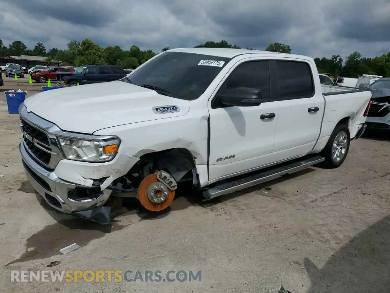 1 Photograph of a damaged car 1C6RREFT6PN573744 RAM 1500 2023