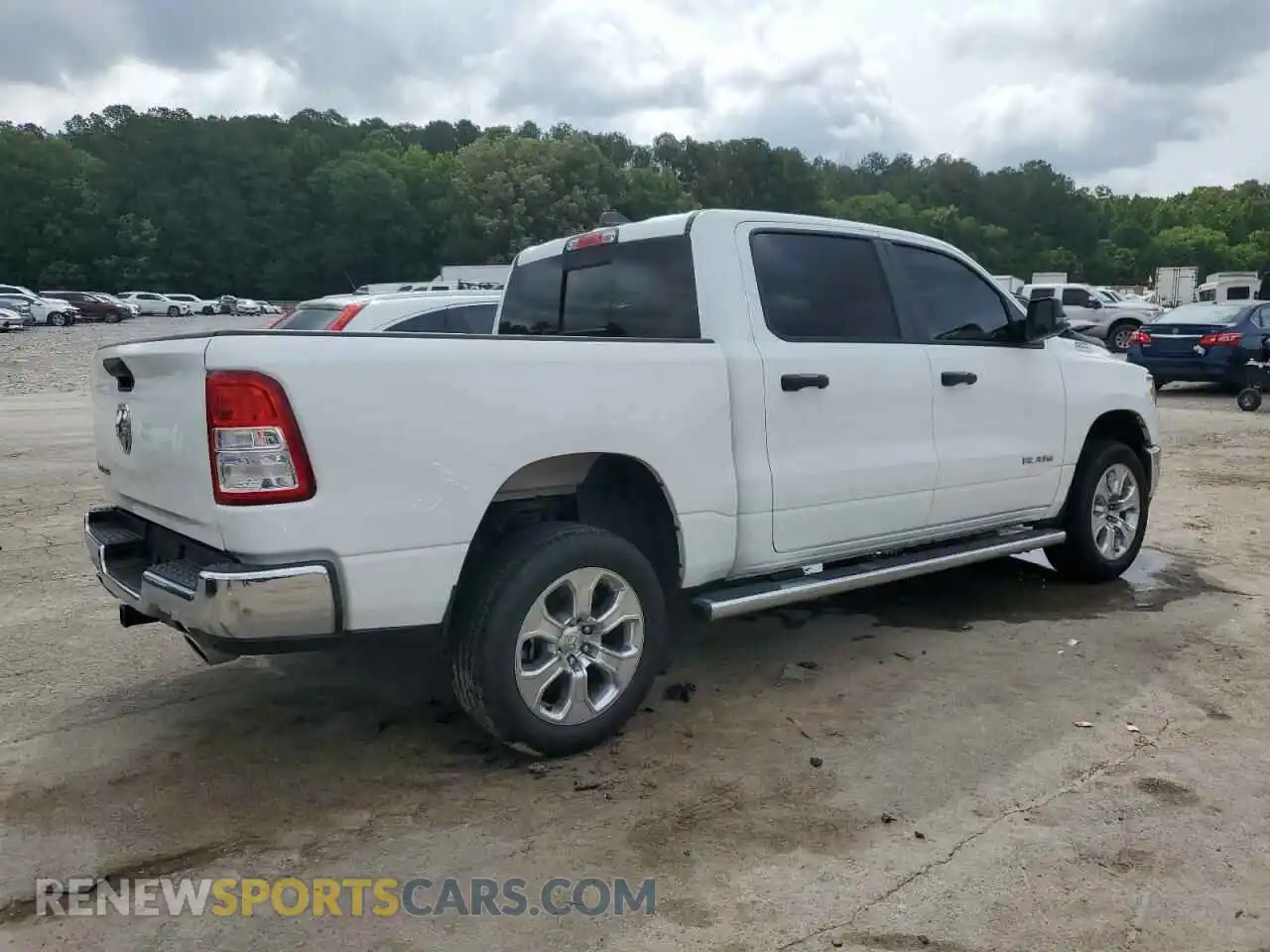 3 Photograph of a damaged car 1C6RREFT6PN573744 RAM 1500 2023