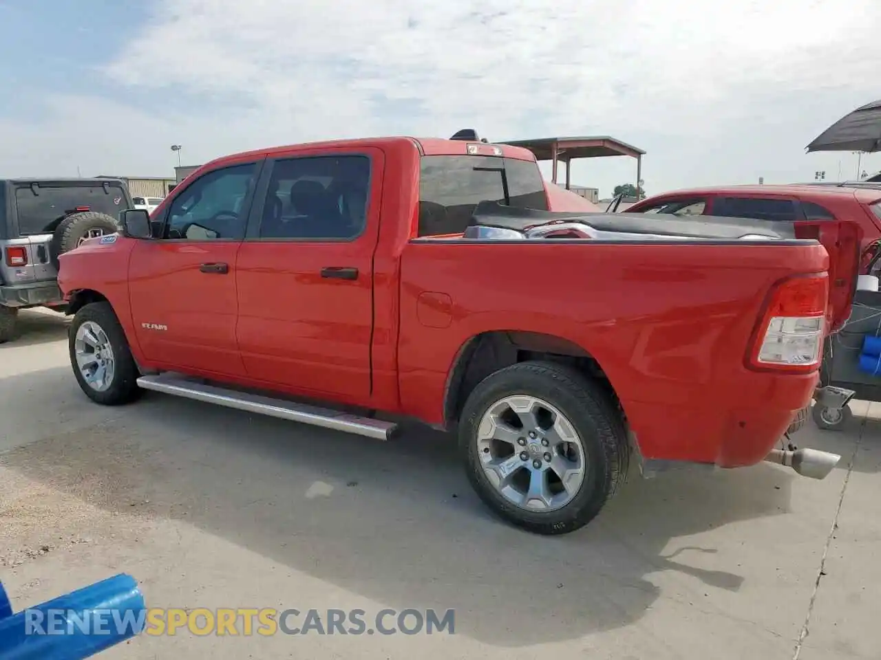2 Photograph of a damaged car 1C6RREFT6PN625969 RAM 1500 2023