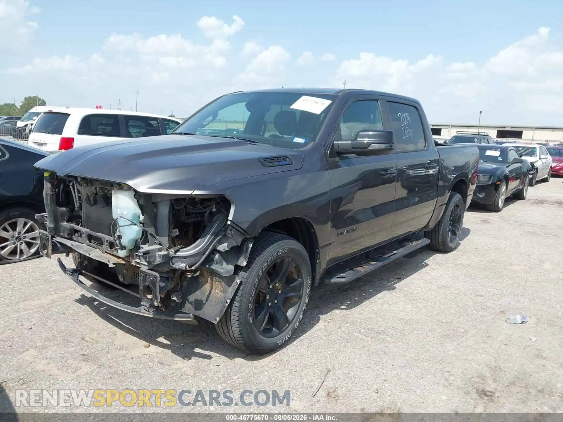 2 Photograph of a damaged car 1C6RREFT8PN565452 RAM 1500 2023