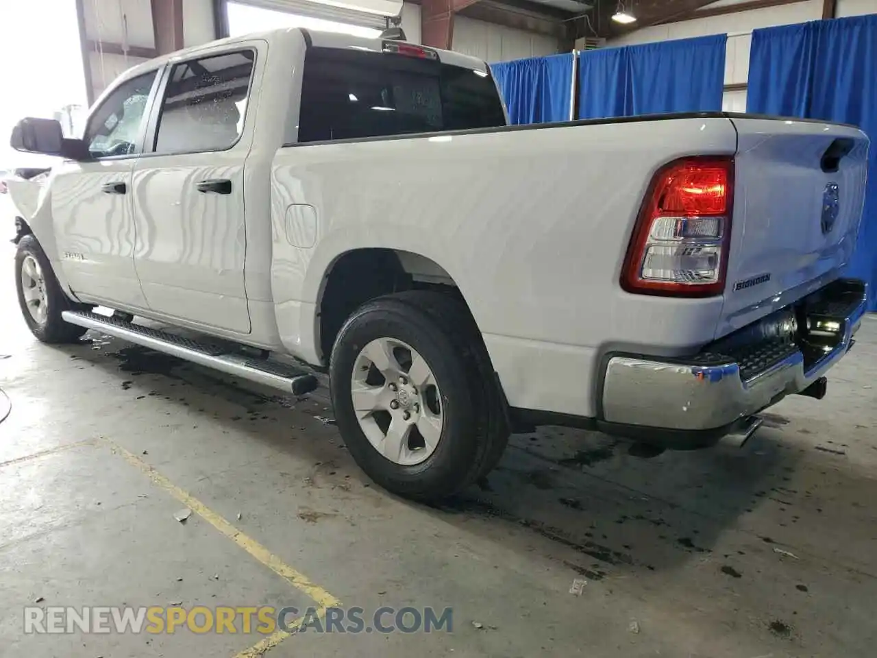 2 Photograph of a damaged car 1C6RREFT9PN654317 RAM 1500 2023