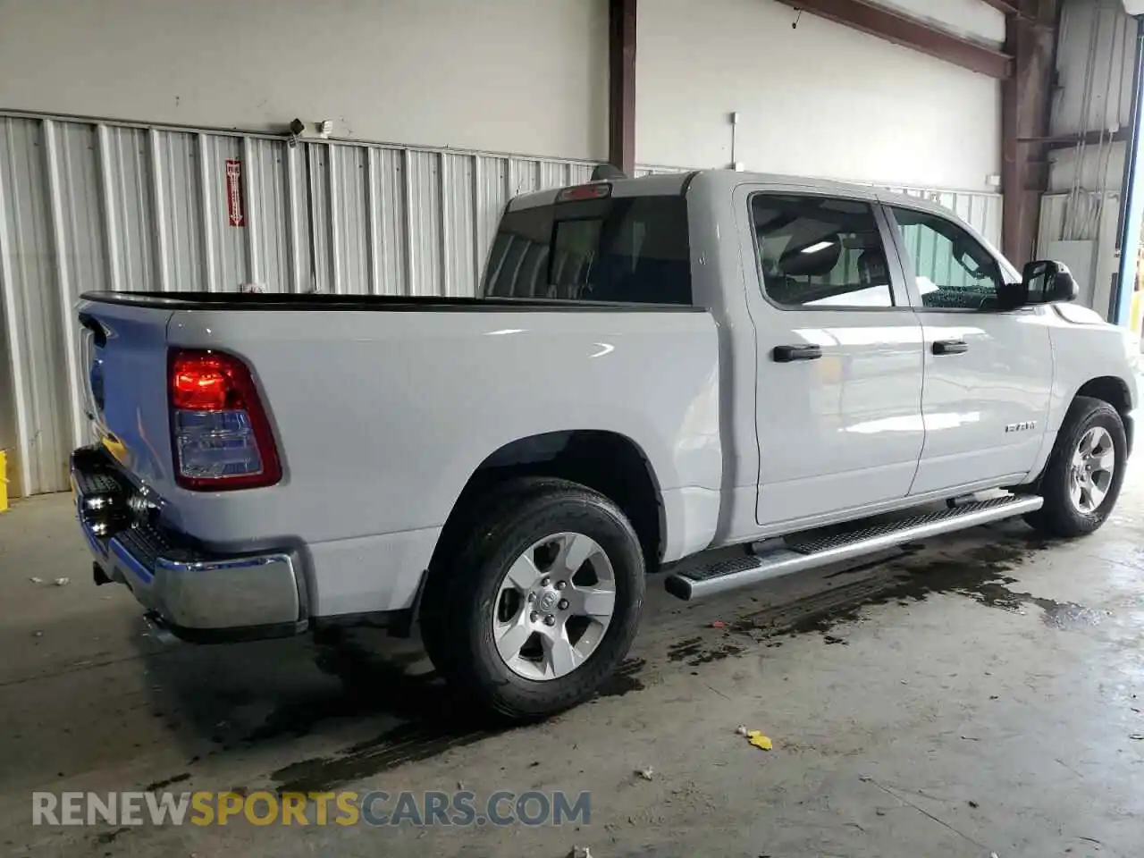 3 Photograph of a damaged car 1C6RREFT9PN654317 RAM 1500 2023