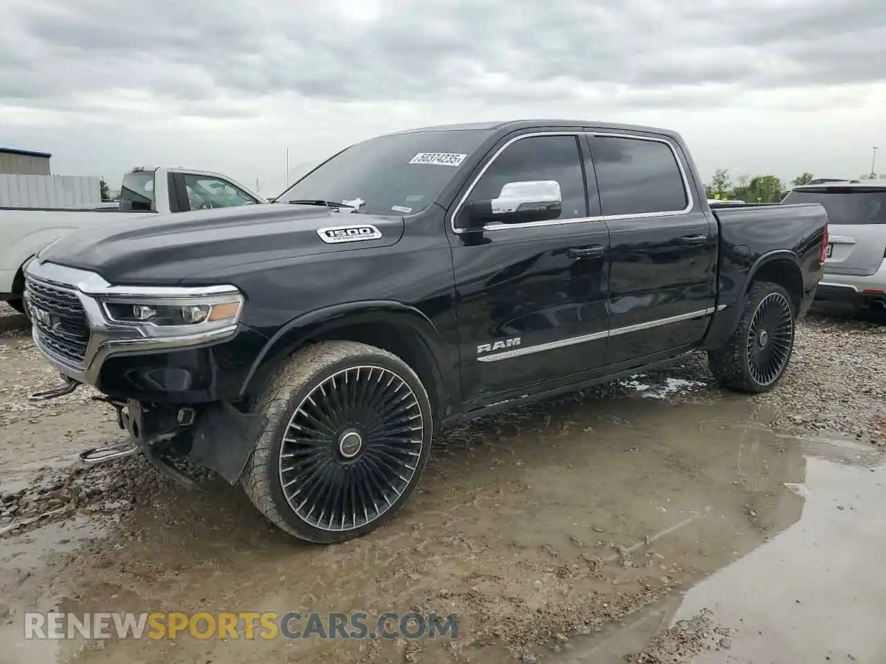 1 Photograph of a damaged car 1C6RREHTXPN604684 RAM 1500 2023