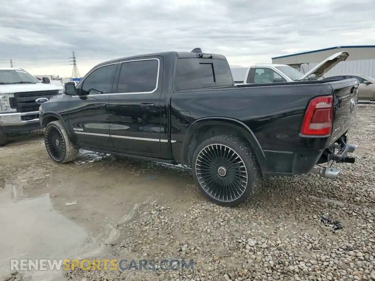 2 Photograph of a damaged car 1C6RREHTXPN604684 RAM 1500 2023