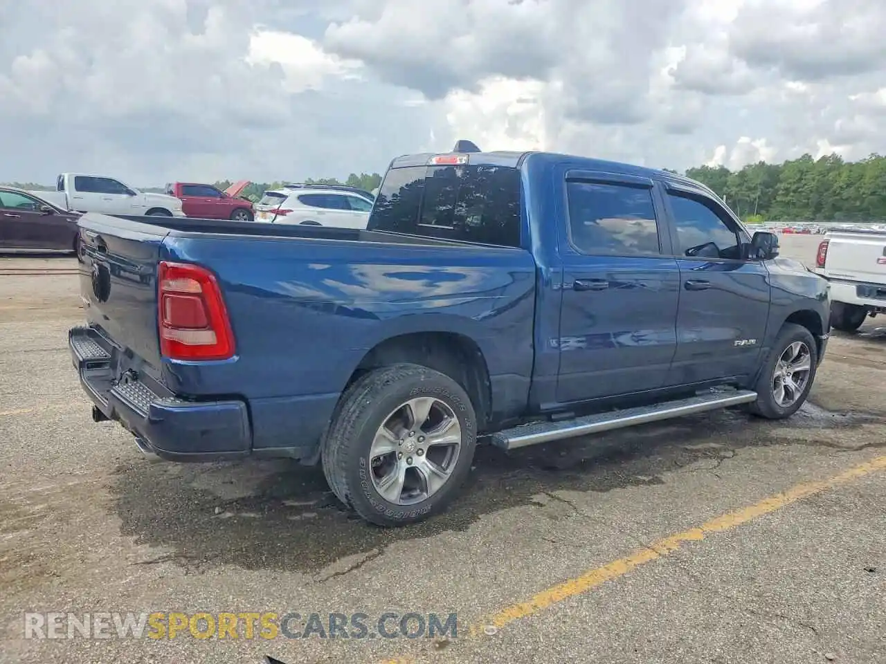 3 Photograph of a damaged car 1C6RREJT0PN670445 RAM 1500 2023