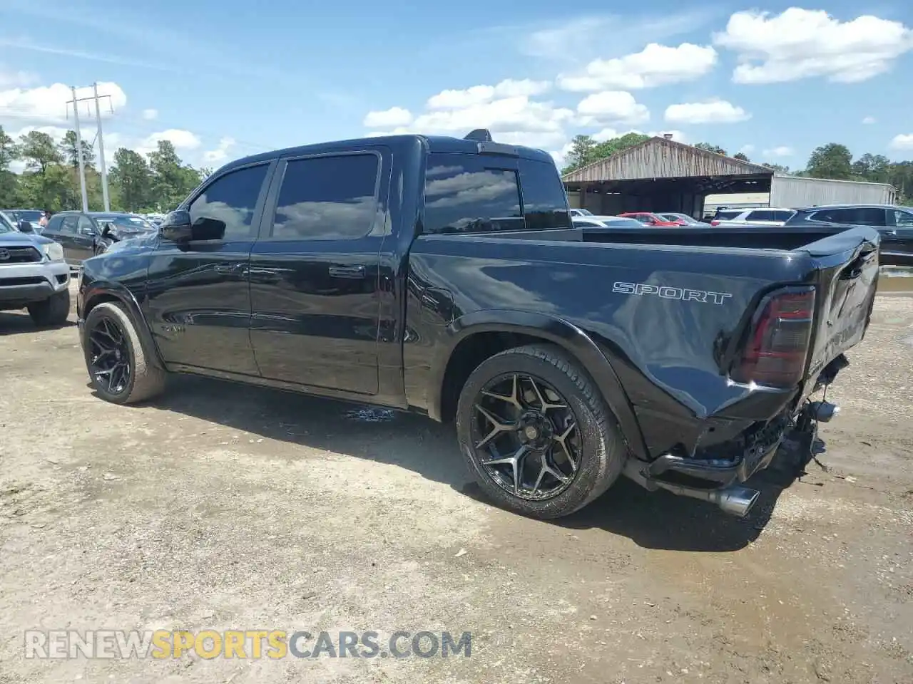 2 fotografías del automóvil dañado 1C6RREJT2PN604298 RAM 1500 2023