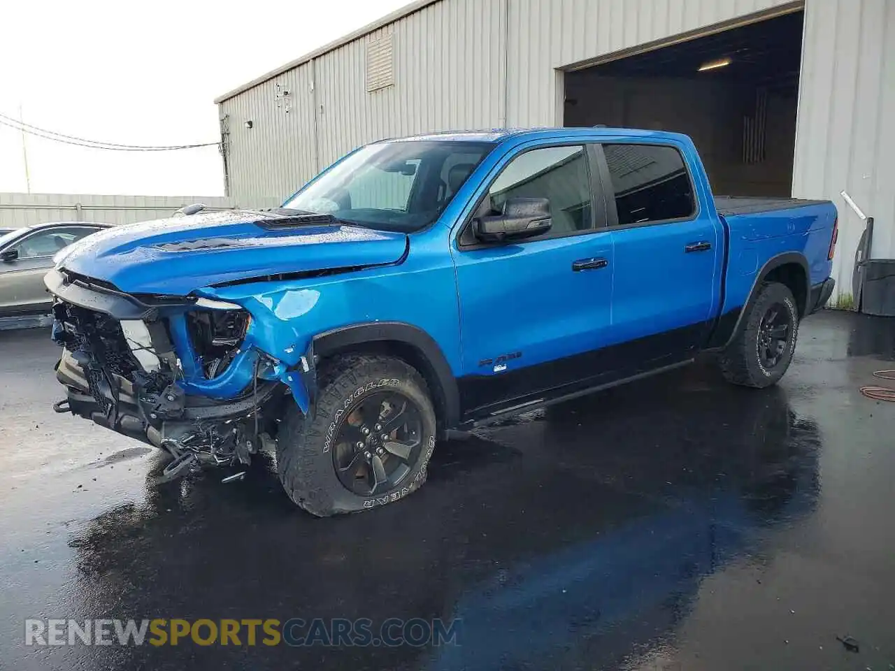 1 Photograph of a damaged car 1C6RRELT8PN572924 RAM 1500 2023