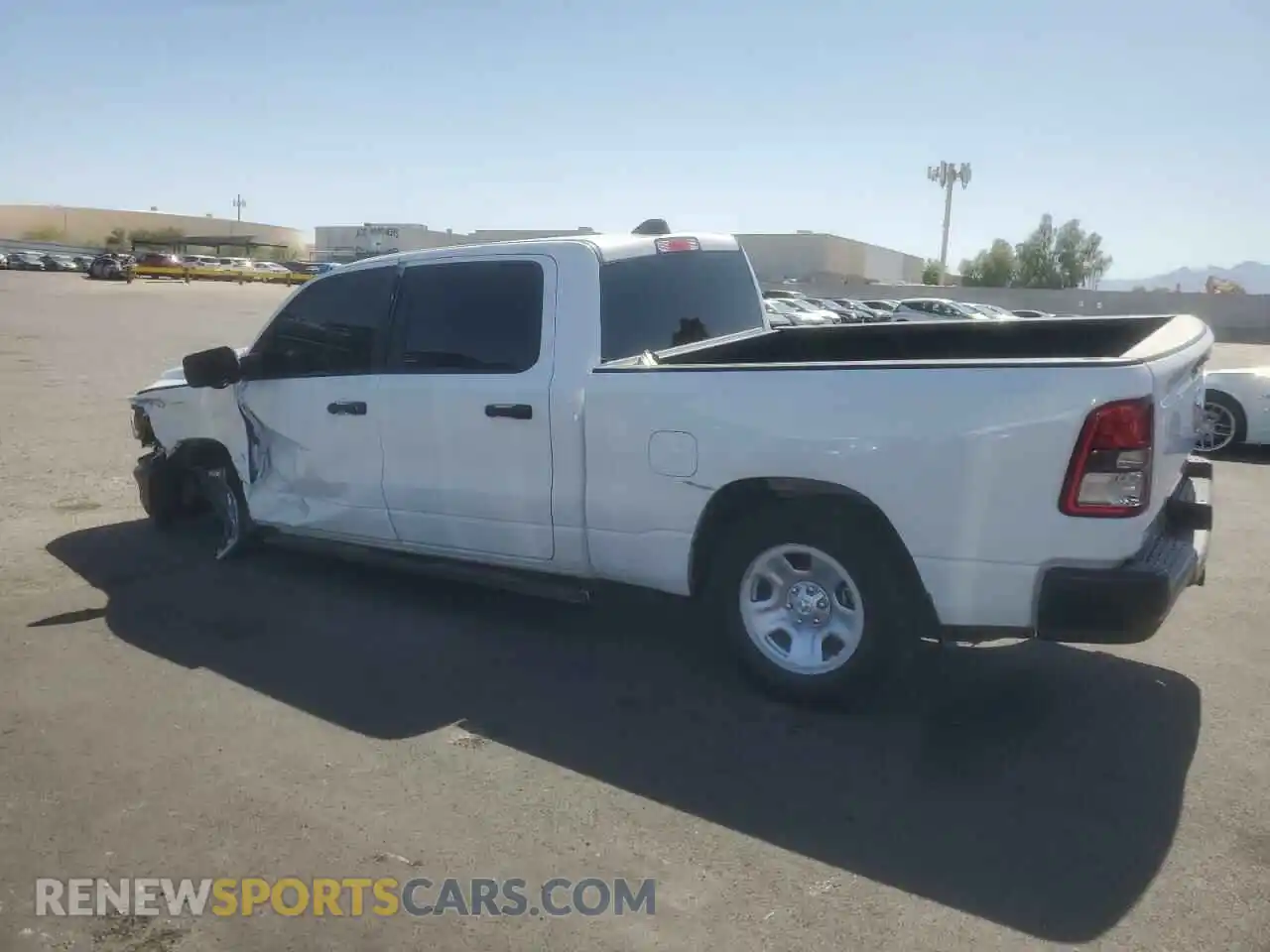 2 Photograph of a damaged car 1C6RRENT0PN693234 RAM 1500 2023
