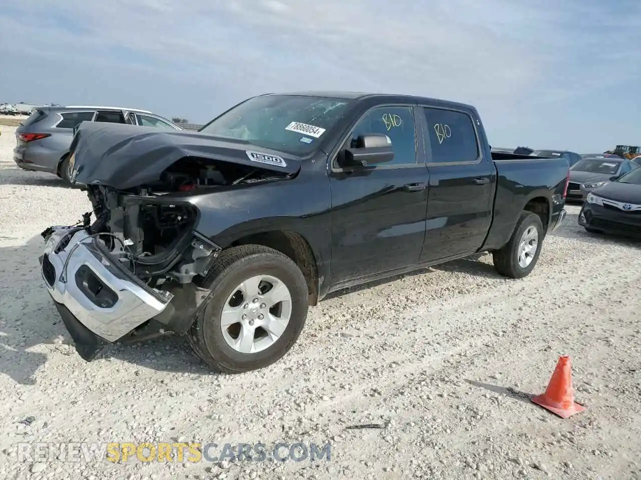 1 Photograph of a damaged car 1C6RRENT7PN619731 RAM 1500 2023