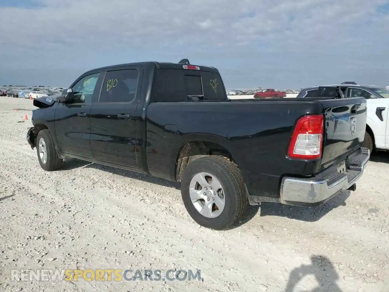 2 Photograph of a damaged car 1C6RRENT7PN619731 RAM 1500 2023