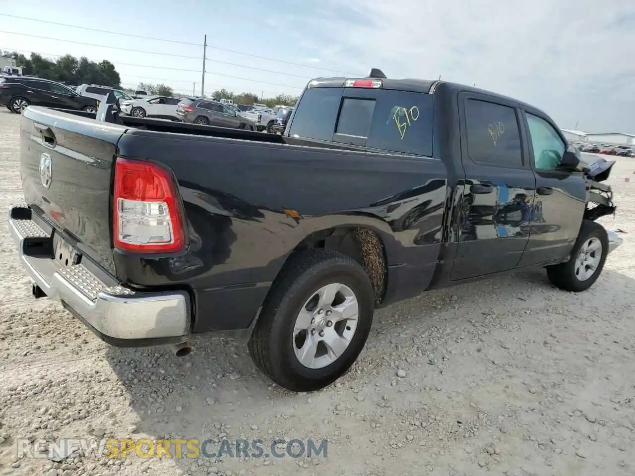 3 Photograph of a damaged car 1C6RRENT7PN619731 RAM 1500 2023