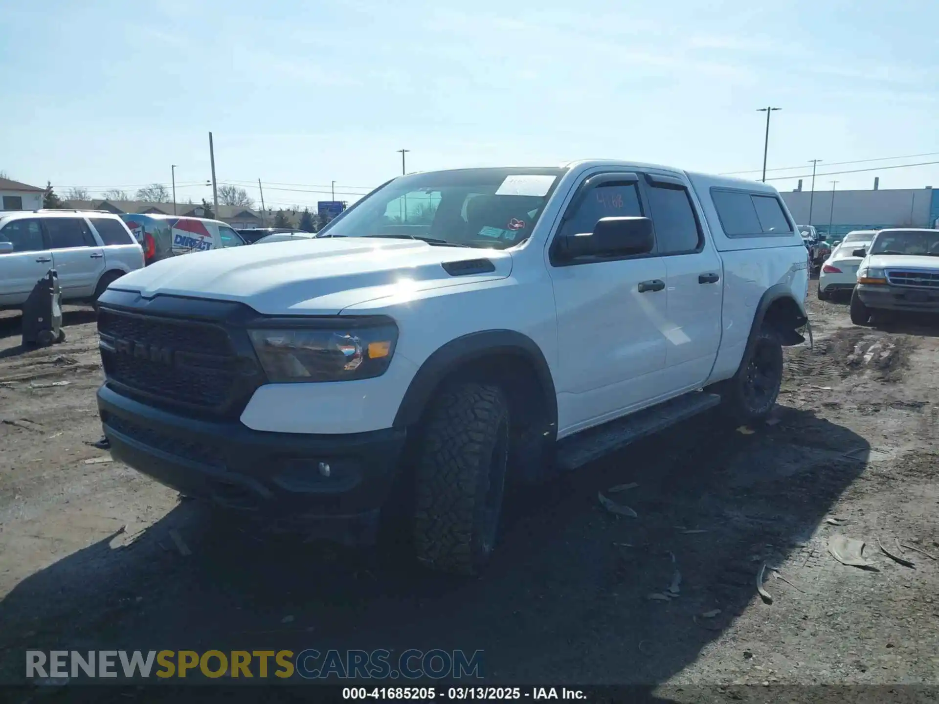 2 Photograph of a damaged car 1C6RRFCG3PN677878 RAM 1500 2023