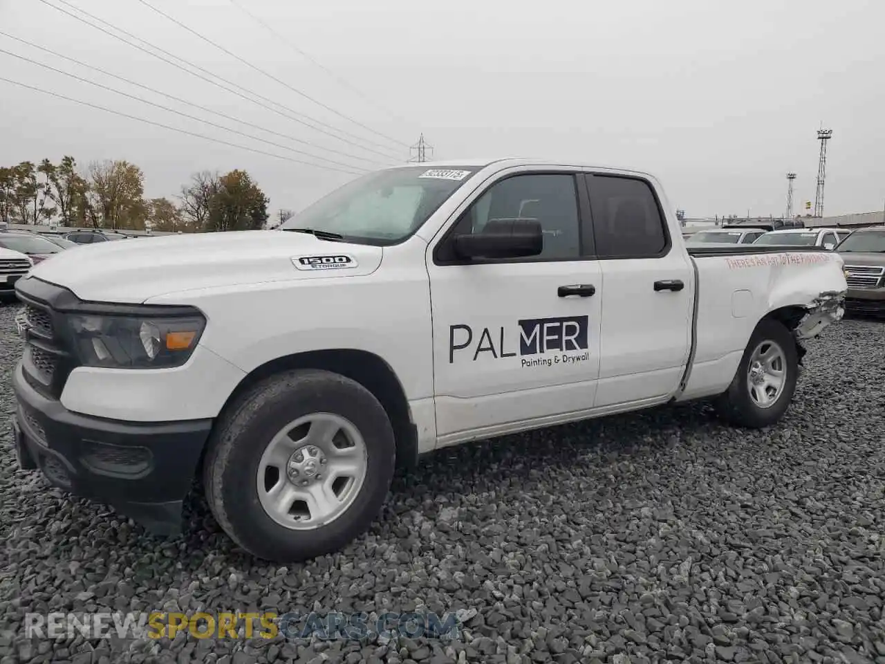 1 Photograph of a damaged car 1C6RRFCG9PN668103 RAM 1500 2023