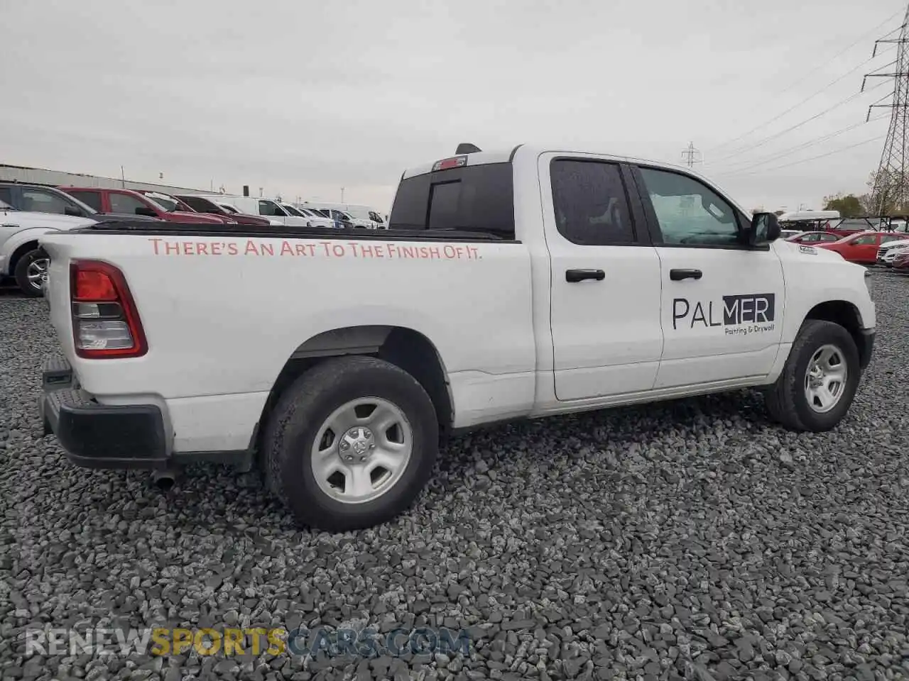 3 Photograph of a damaged car 1C6RRFCG9PN668103 RAM 1500 2023
