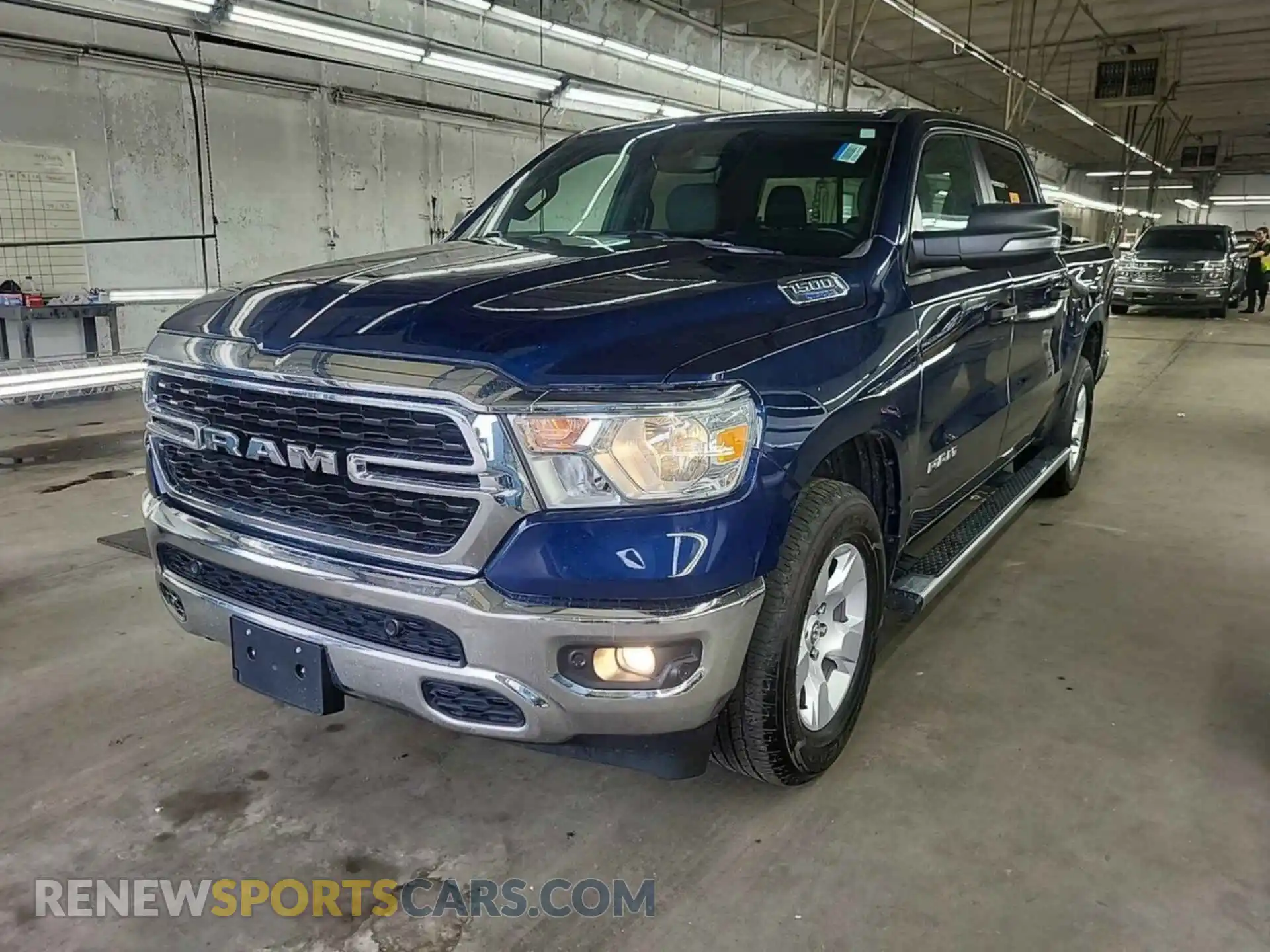 3 Photograph of a damaged car 1C6RRFFG5PN574697 RAM 1500 2023
