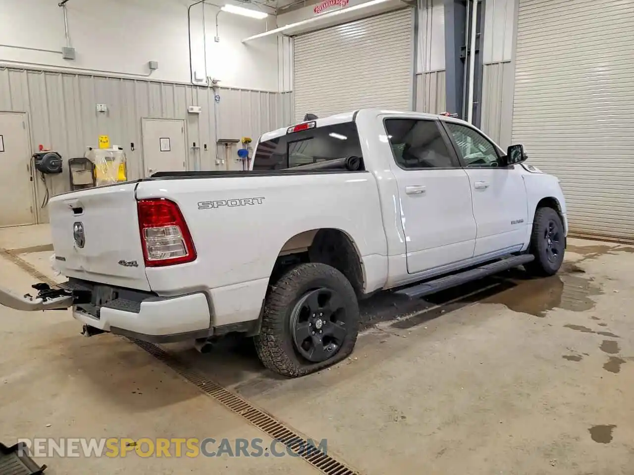 3 Photograph of a damaged car 1C6RRFFG5PN656932 RAM 1500 2023