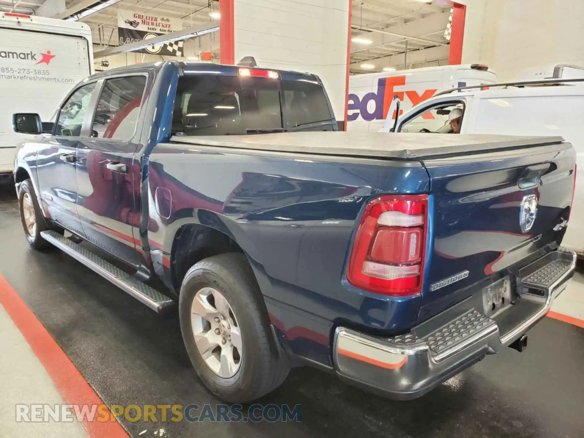 3 Photograph of a damaged car 1C6RRFFG8PN560955 RAM 1500 2023