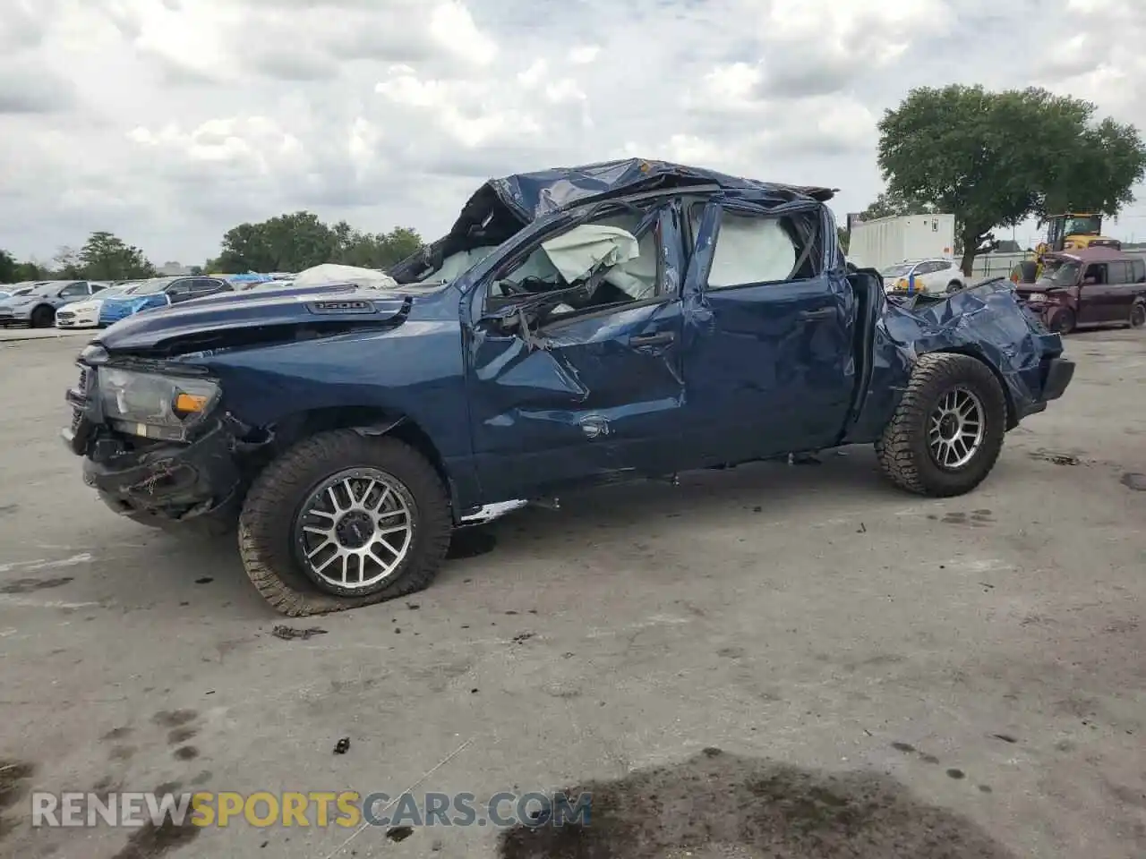 1 Photograph of a damaged car 1C6RRFGG0PN683910 RAM 1500 2023