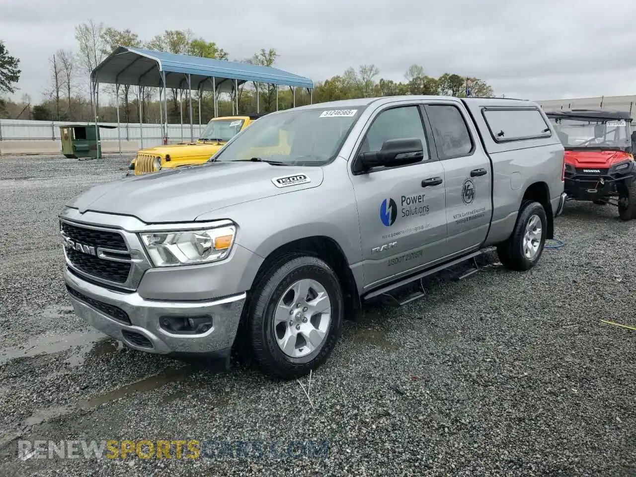 1 Photograph of a damaged car 1C6SRFBT0PN627388 RAM 1500 2023