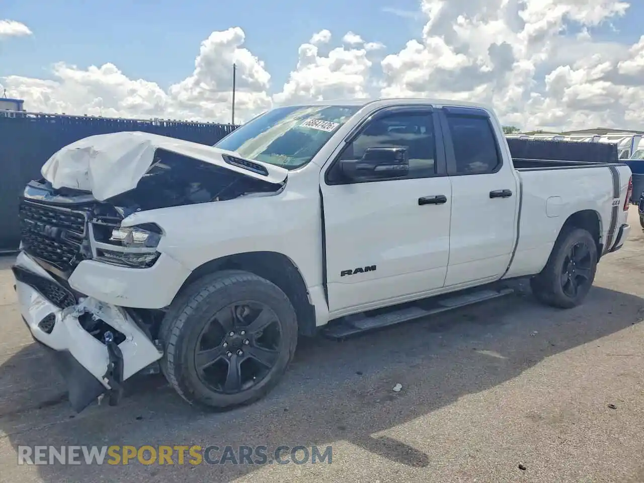 1 Photograph of a damaged car 1C6SRFBT3PN543310 RAM 1500 2023