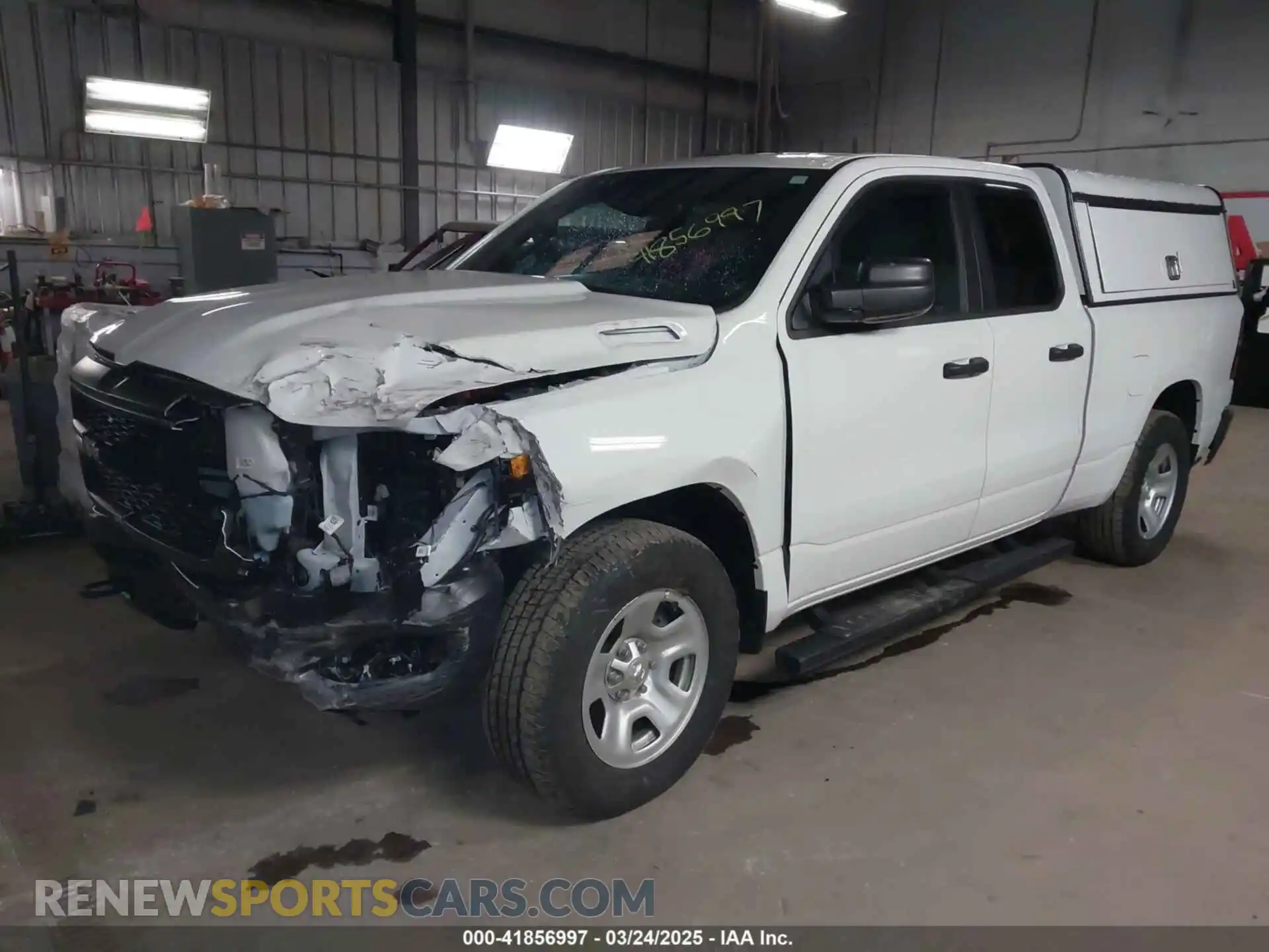 2 Photograph of a damaged car 1C6SRFCT5PN580213 RAM 1500 2023