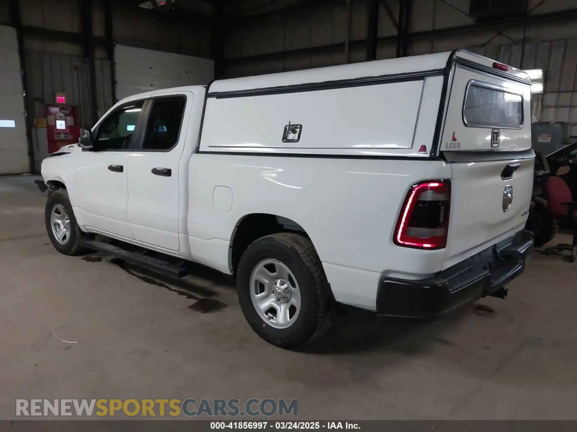3 Photograph of a damaged car 1C6SRFCT5PN580213 RAM 1500 2023