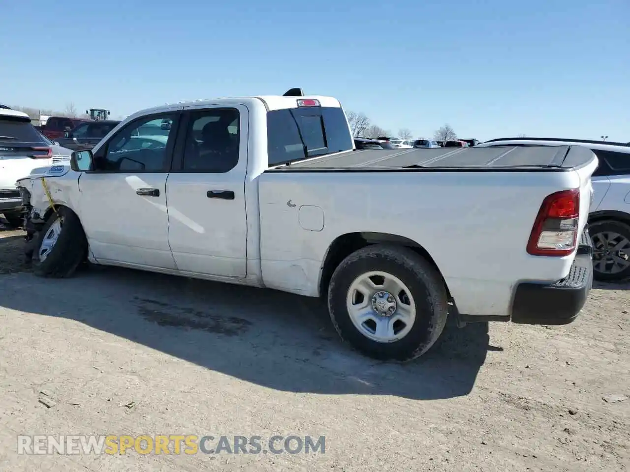 2 fotografías del automóvil dañado 1C6SRFCT5PN677234 RAM 1500 2023