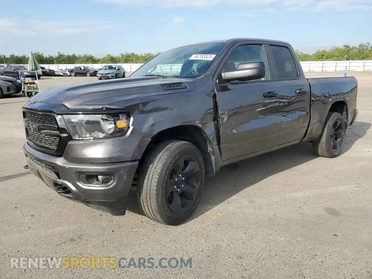 1 Photograph of a damaged car 1C6SRFCTXPN673129 RAM 1500 2023