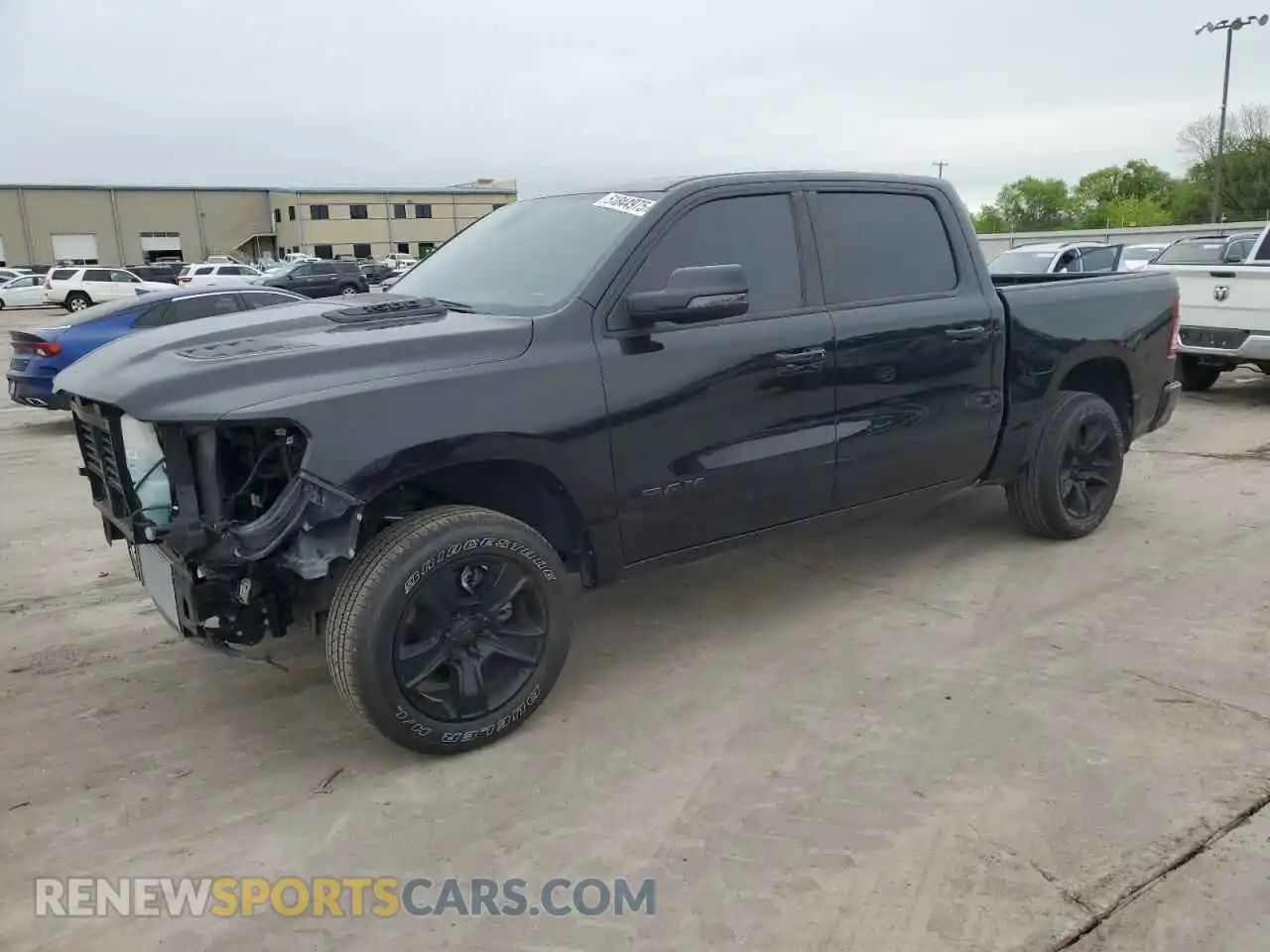 1 Photograph of a damaged car 1C6SRFFM2PN513105 RAM 1500 2023