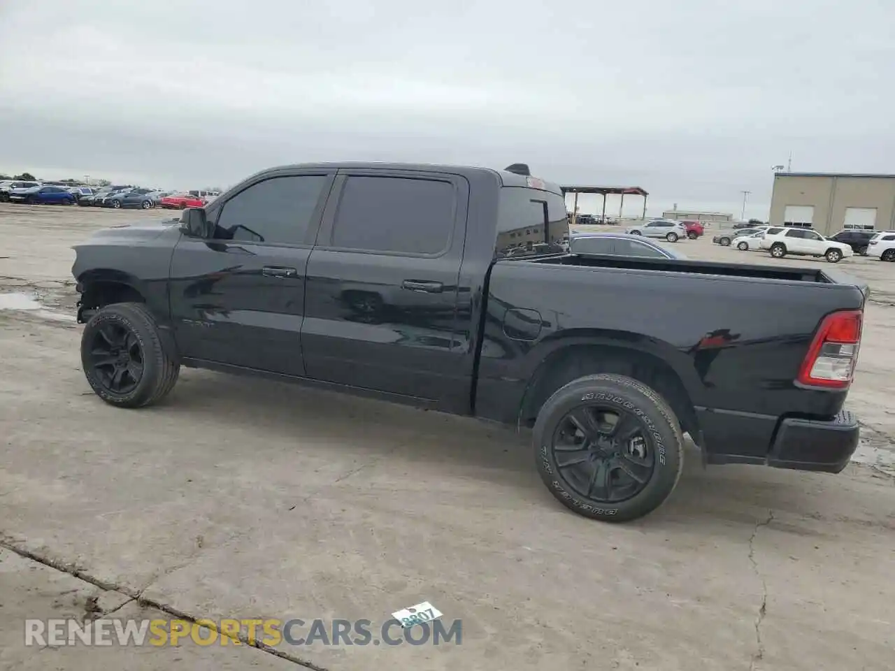 2 Photograph of a damaged car 1C6SRFFM2PN513105 RAM 1500 2023