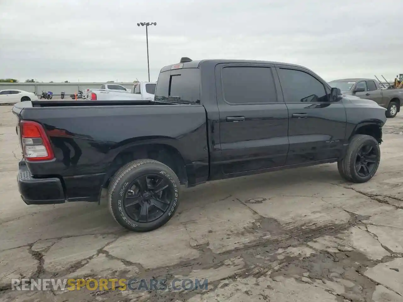 3 Photograph of a damaged car 1C6SRFFM2PN513105 RAM 1500 2023