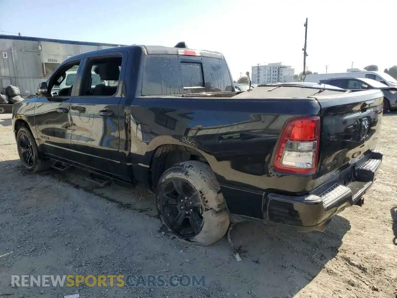 2 Photograph of a damaged car 1C6SRFFM3PN520774 RAM 1500 2023