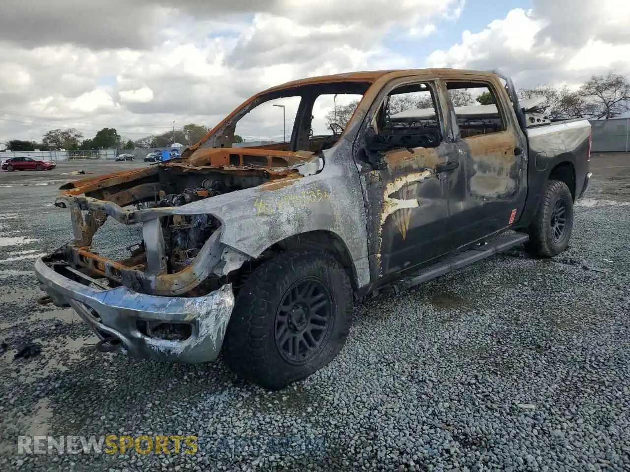 1 Photograph of a damaged car 1C6SRFFMXPN561998 RAM 1500 2023