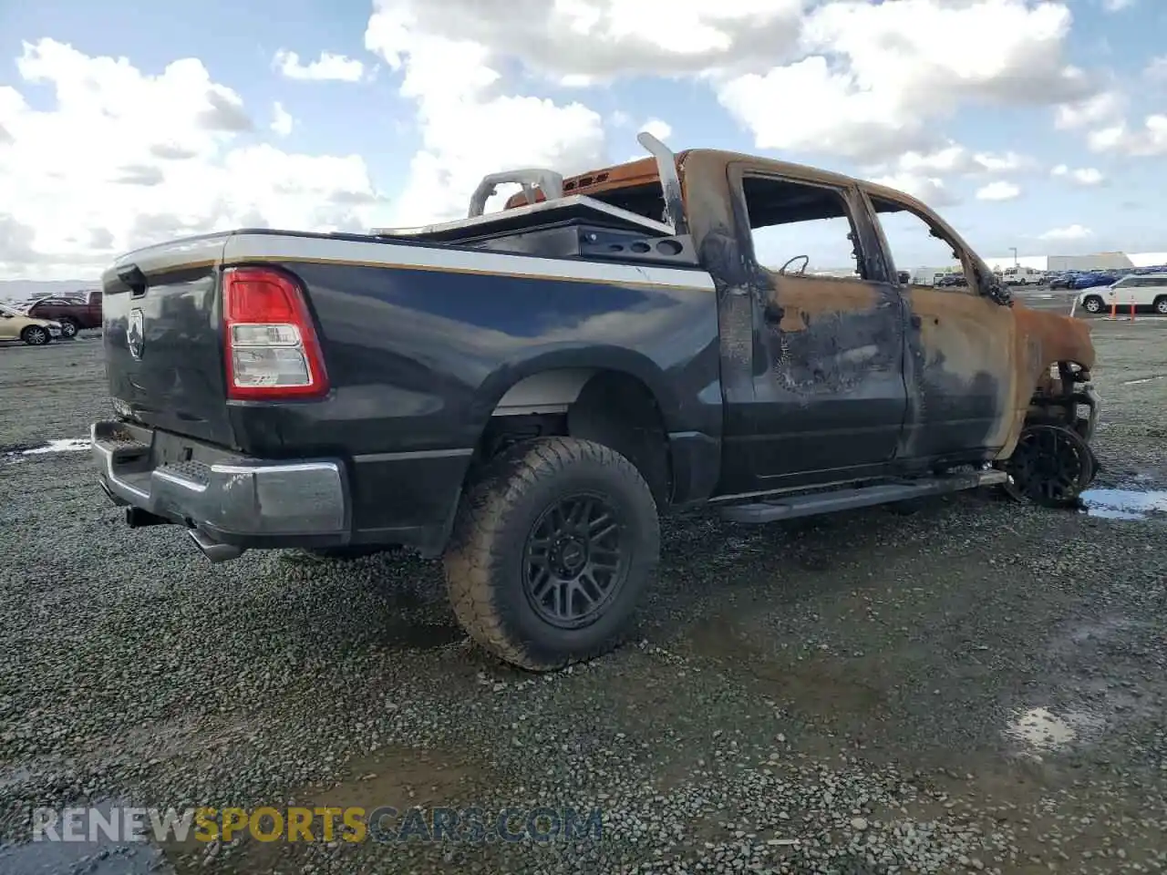 3 Photograph of a damaged car 1C6SRFFMXPN561998 RAM 1500 2023
