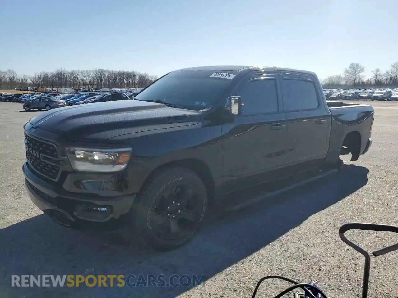 1 Photograph of a damaged car 1C6SRFFT0PN613131 RAM 1500 2023