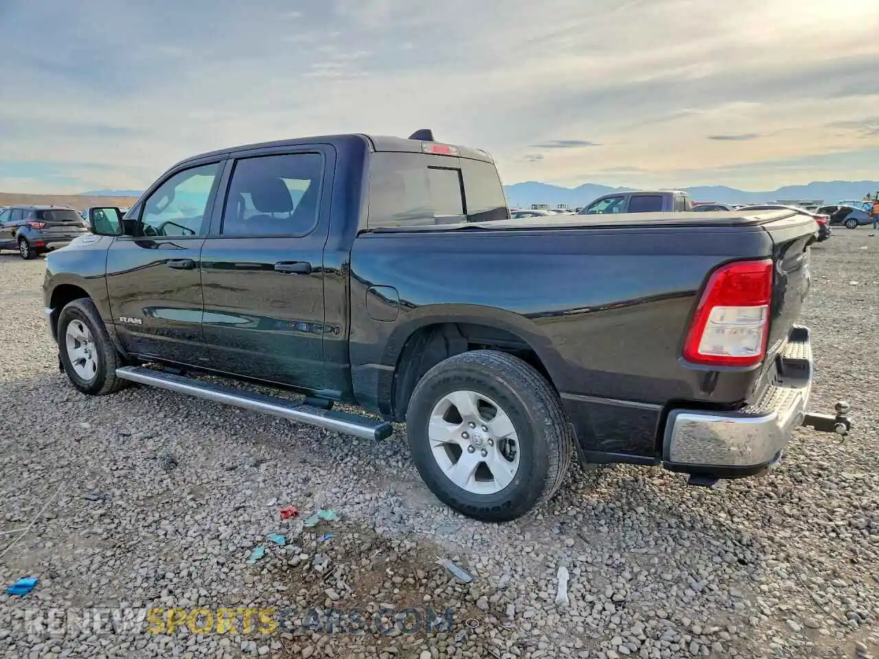 2 Photograph of a damaged car 1C6SRFFT1PN506850 RAM 1500 2023