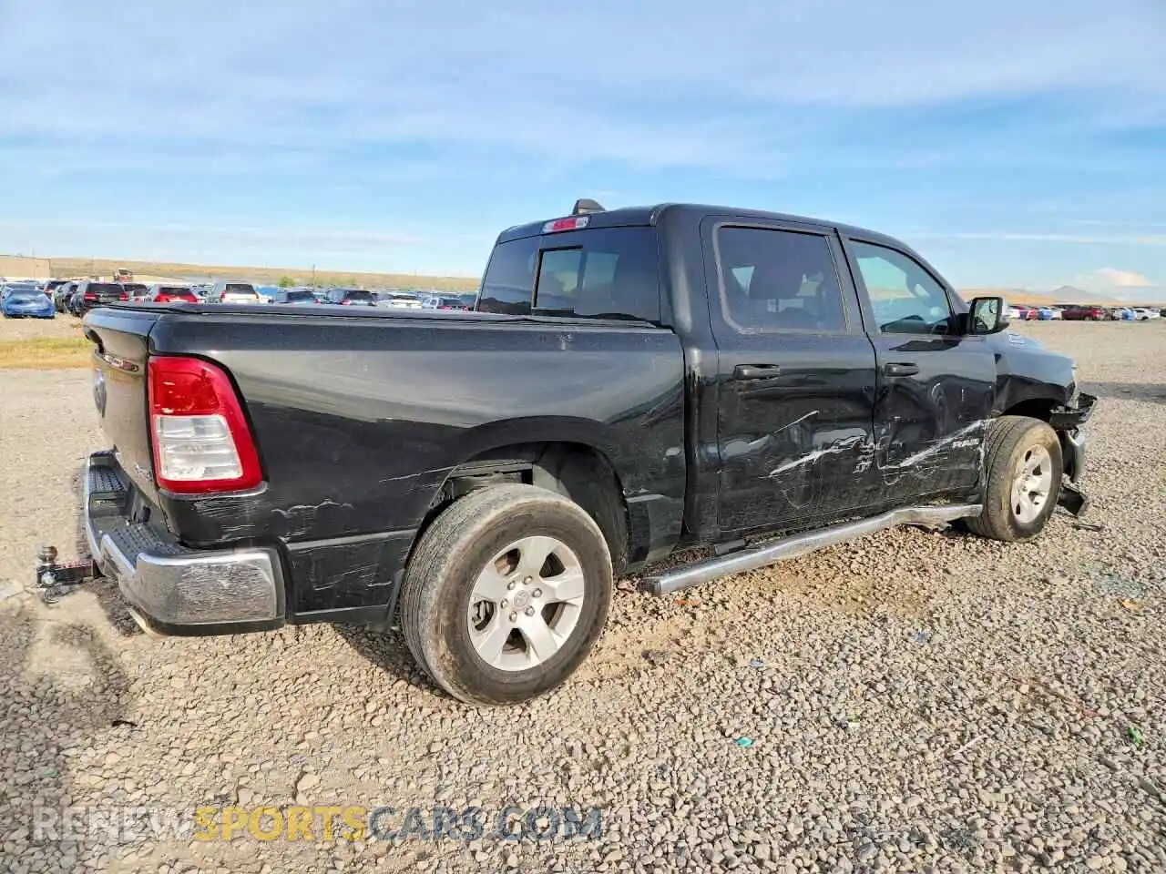 3 Photograph of a damaged car 1C6SRFFT1PN506850 RAM 1500 2023