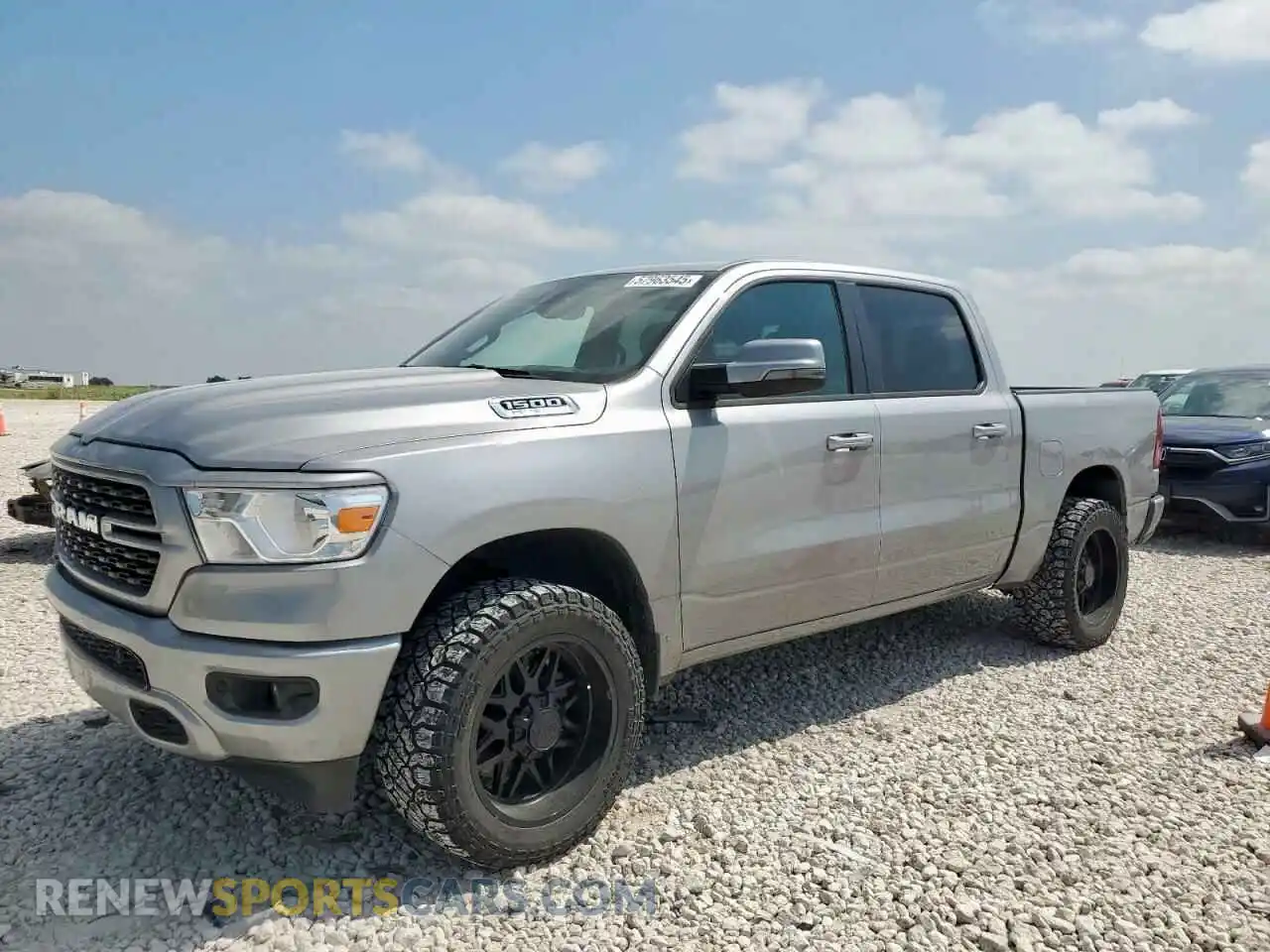 1 Photograph of a damaged car 1C6SRFFT1PN701718 RAM 1500 2023