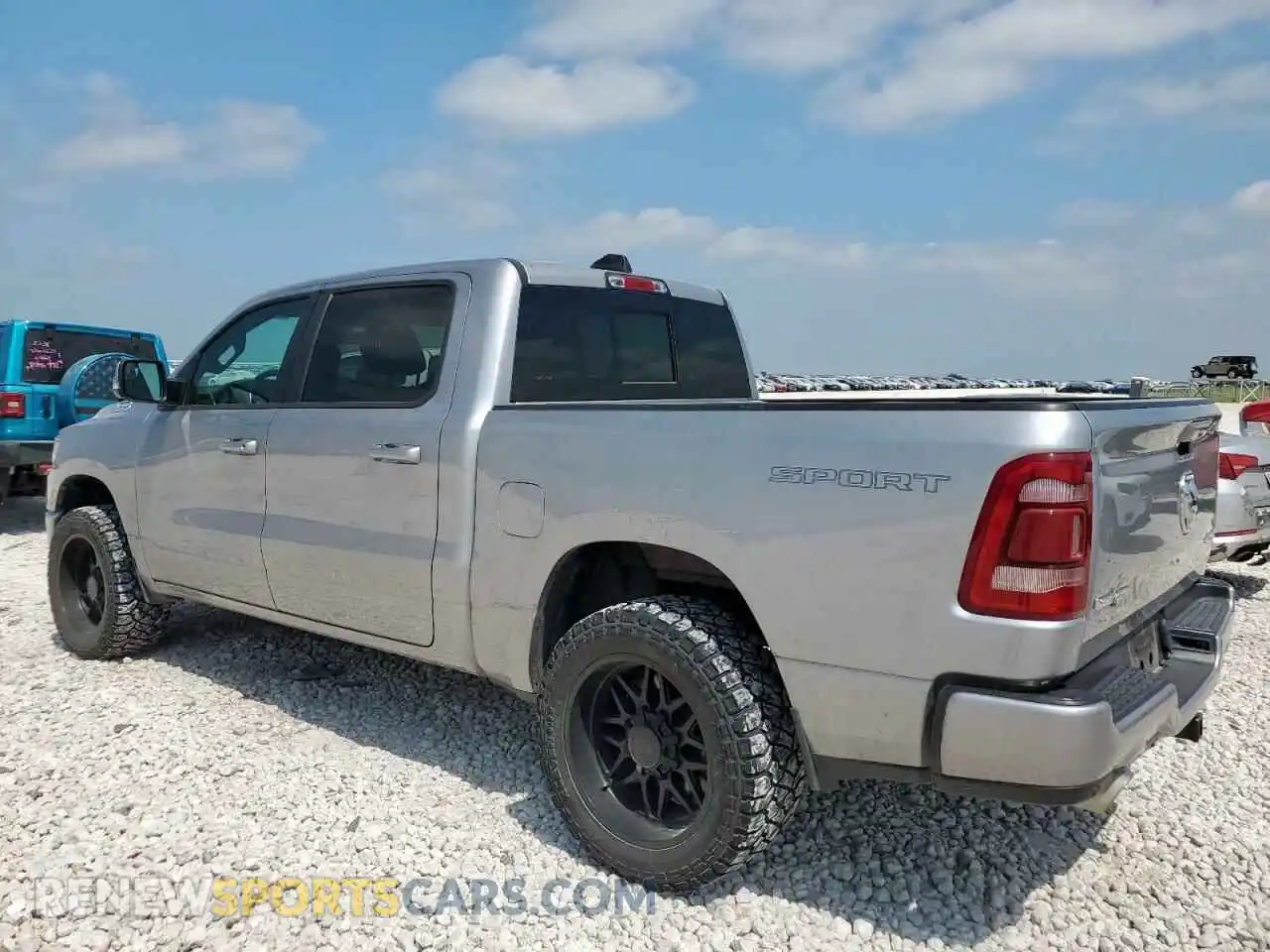 2 Photograph of a damaged car 1C6SRFFT1PN701718 RAM 1500 2023