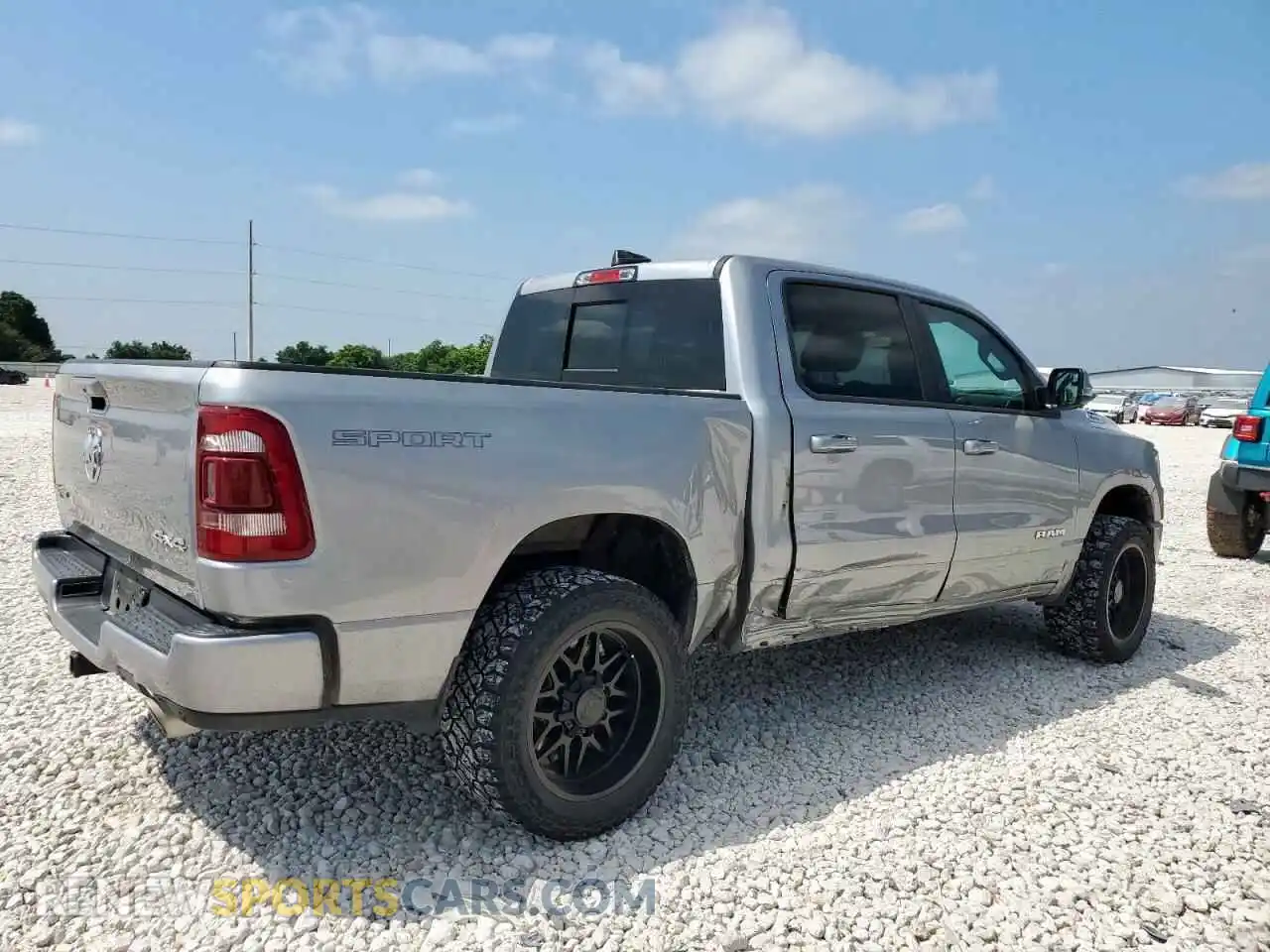 3 Photograph of a damaged car 1C6SRFFT1PN701718 RAM 1500 2023