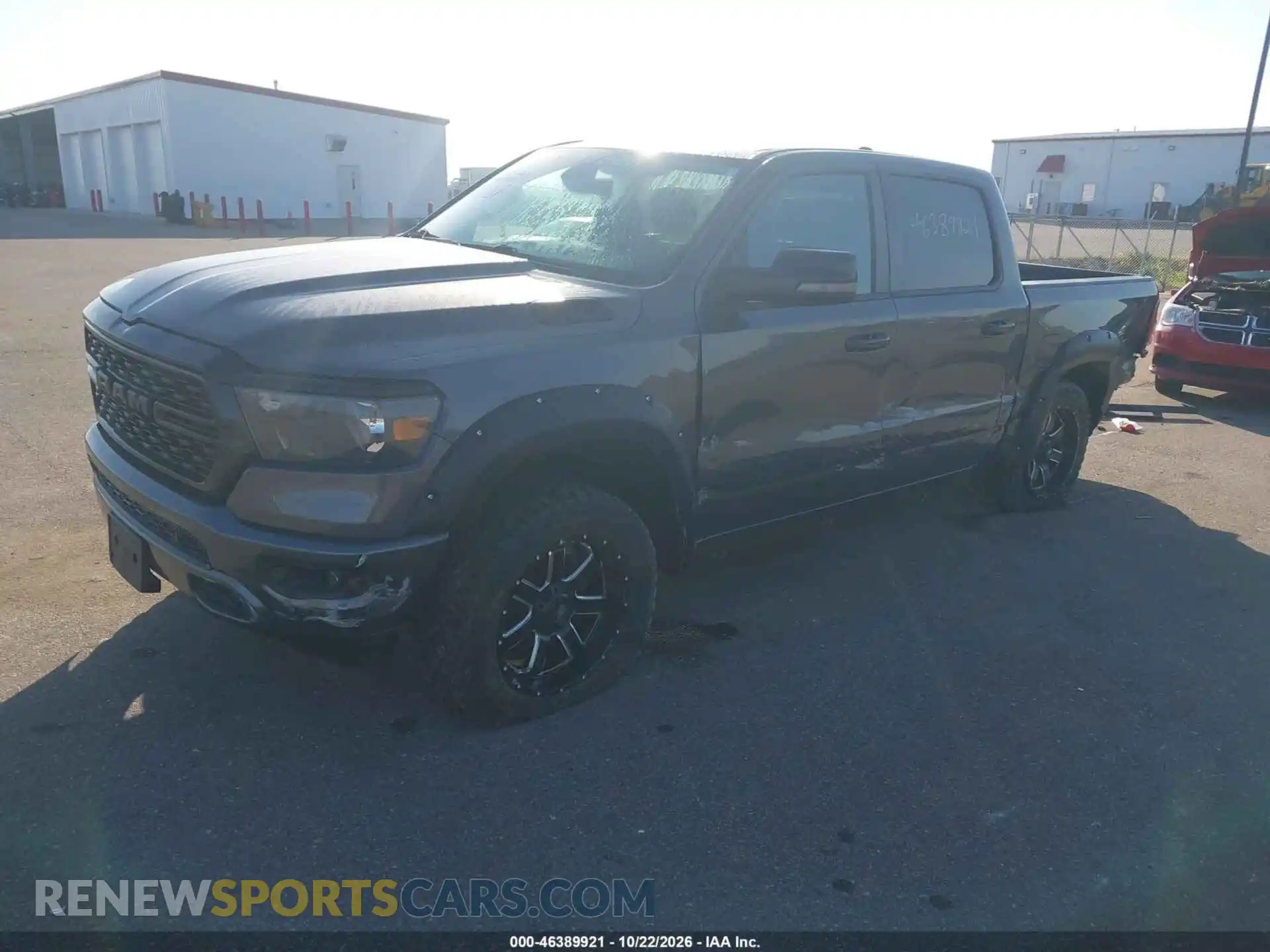 2 Photograph of a damaged car 1C6SRFFT2PN533264 RAM 1500 2023
