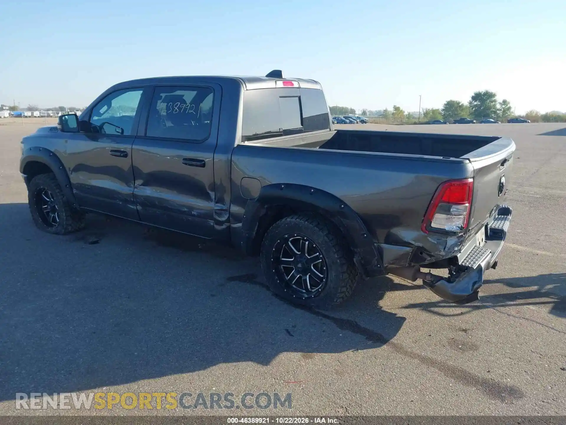 3 Photograph of a damaged car 1C6SRFFT2PN533264 RAM 1500 2023