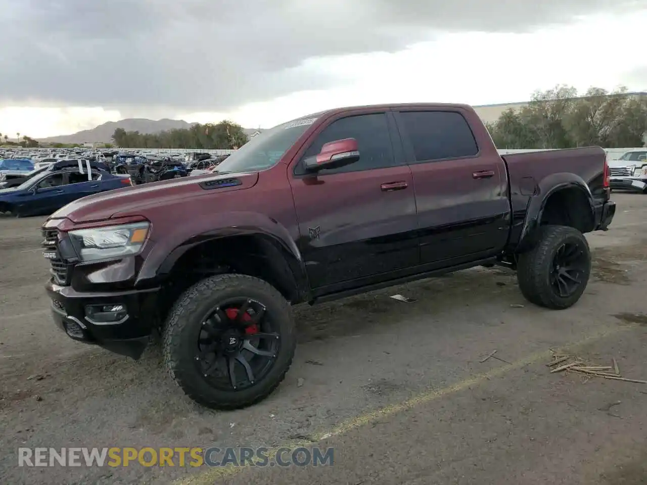 1 Photograph of a damaged car 1C6SRFFT2PN549979 RAM 1500 2023