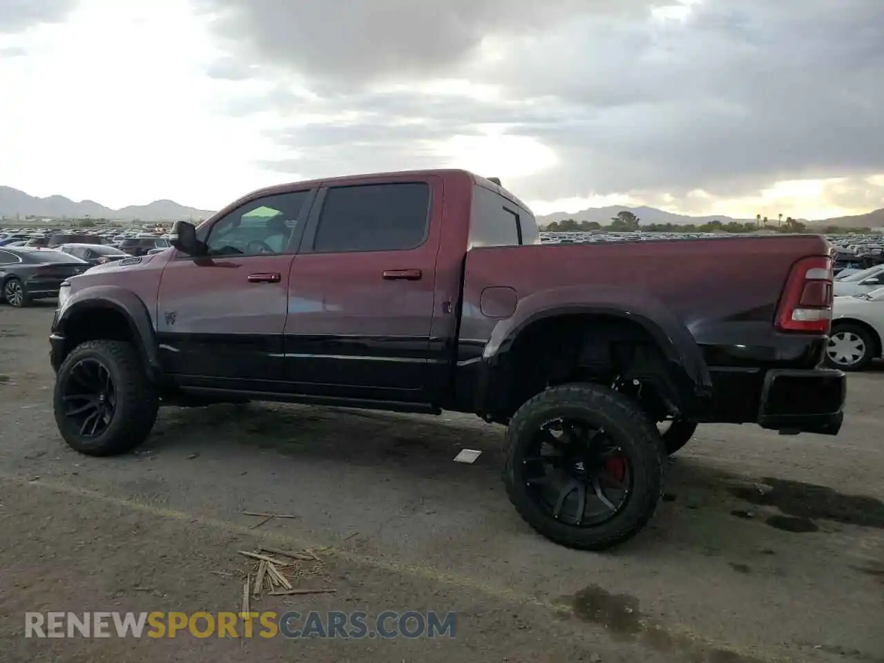 2 Photograph of a damaged car 1C6SRFFT2PN549979 RAM 1500 2023