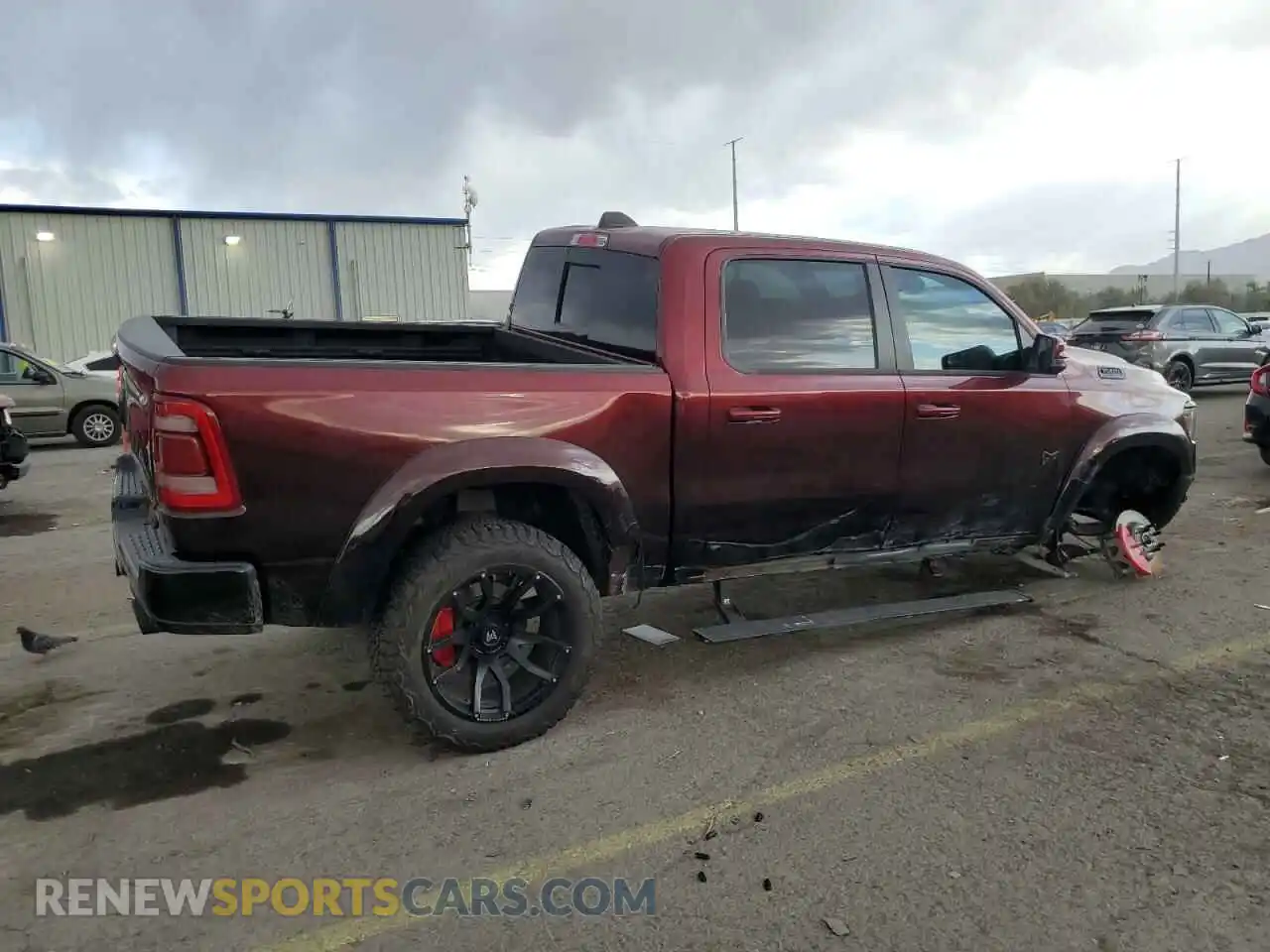 3 Photograph of a damaged car 1C6SRFFT2PN549979 RAM 1500 2023