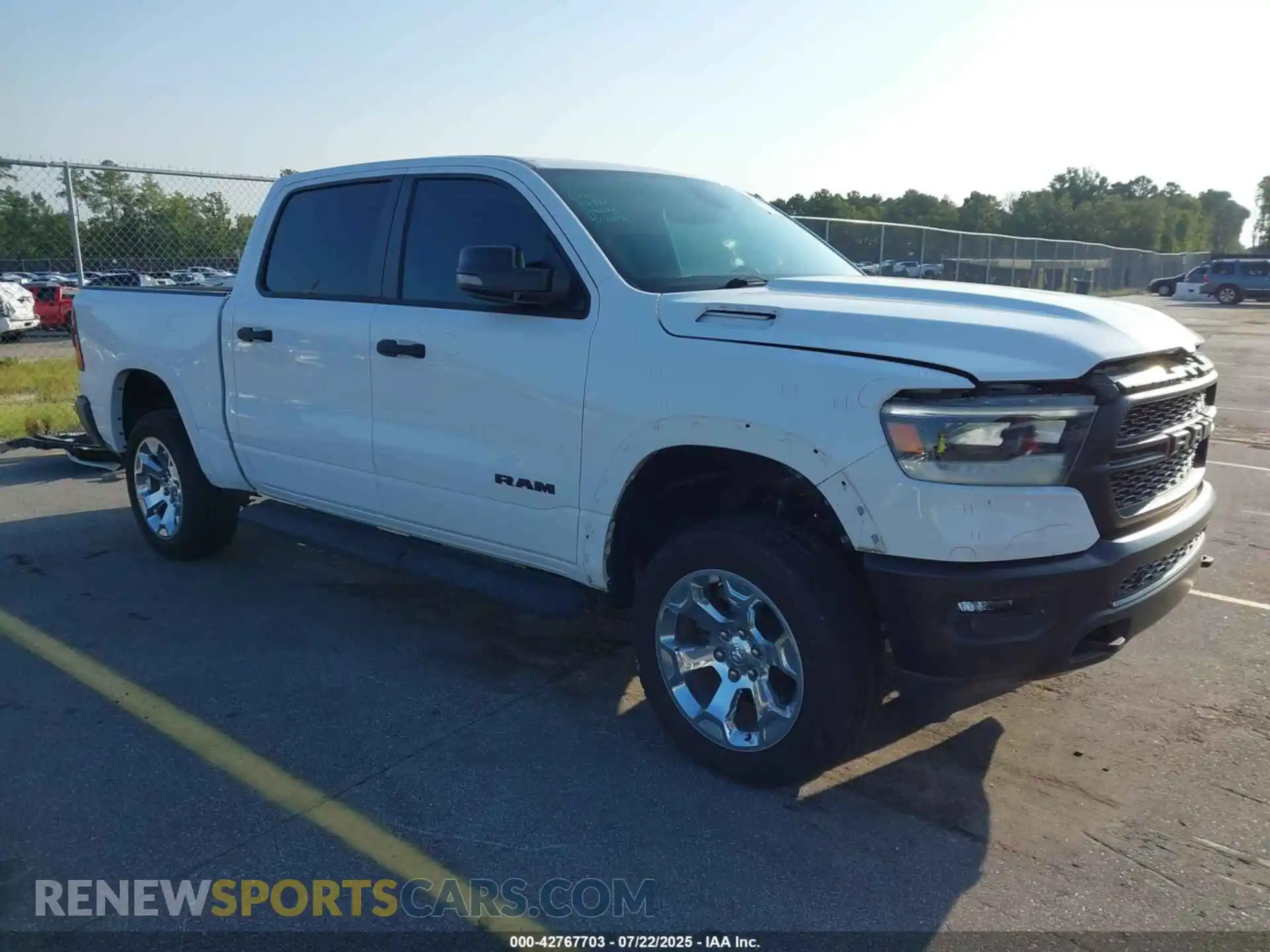 1 Photograph of a damaged car 1C6SRFFT2PN575076 RAM 1500 2023